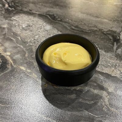 Соус Сырный в Суши-бар Макото по цене 50 ₽