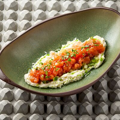 Тартар из форели с огурцом и сливочным кремом в KITCHEN по цене 860 ₽