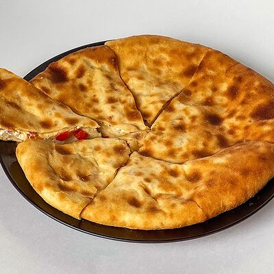 Осетинский пирог с сыром и помидорами в Осетинские пироги от Бирюзы по цене 790 ₽