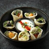 Пельмени с камчатским крабом и северными креветками в Fish Point