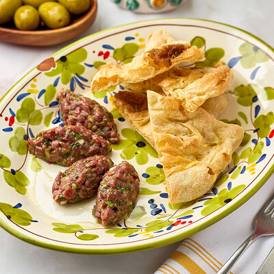 Тартар из говяжьей вырезки в Osteria Dolce по цене 1190 ₽