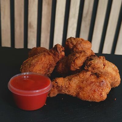 Крылышки Фри в Мясорубка бистро по цене 365 ₽