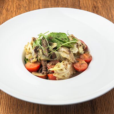 Тёплый салат с куриной печенью в Помидорро по цене 535 ₽