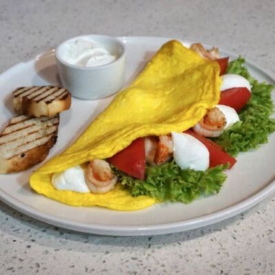 Омлет с креветками на гриле в Berberry & ptichka по цене 599 ₽