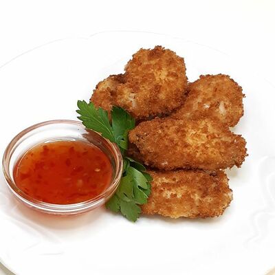 Куриные крылышки в хрустящей панировке с острым соусом в Дуровъ по цене 250 ₽