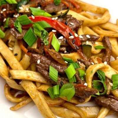 Вок с говядинойв Баодзен по цене 420 ₽