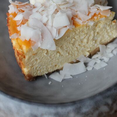 Манго-чизкейк в Хюгге Сырный ресторан по цене 490 ₽