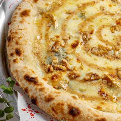 Пицца Четыре сыра в Итальянцы по цене 910 ₽