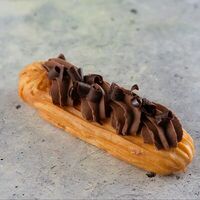 Эклер шоколадный в Матрешка