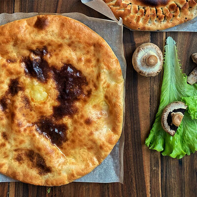 Осетинский пирог с сыром и листьями свеклы в Ирбис по цене 300