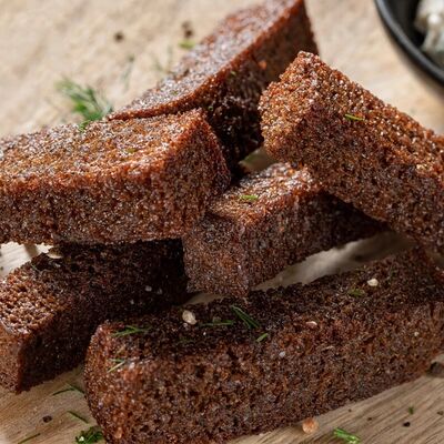 Гренки с чесноком в АНАКОНДА по цене 349 ₽
