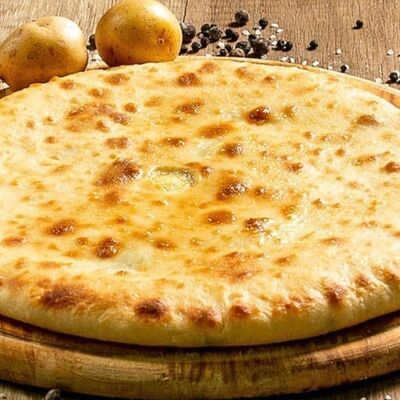 Осетинский пирог Курица-картошка в Осетинские пироги по цене 790 ₽