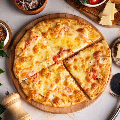 Пицца Маргарита в Boochino по цене 470 ₽