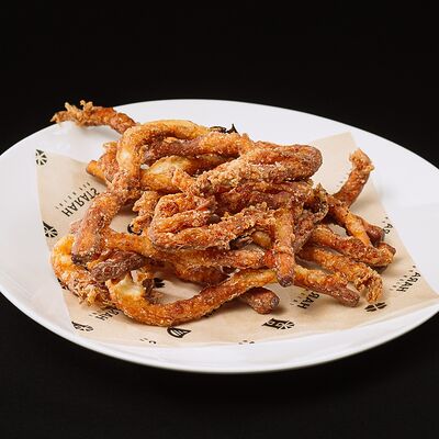 Жареный сыр косичка в Harats Pub по цене 322 ₽