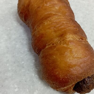 Сосиска в тесте жаренная в Кулинария уплетайка по цене 64 ₽