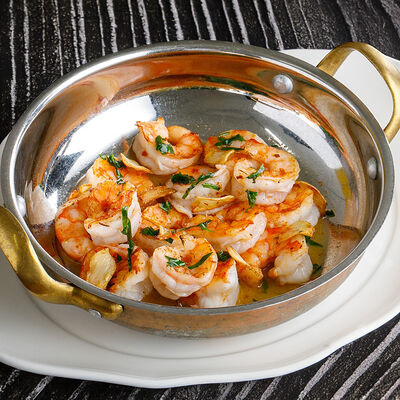 Креветки с чесноком и петрушкой в Ginza по цене 1590 ₽