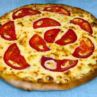 Пицца маргарита в Хлеборезов по цене 490 ₽