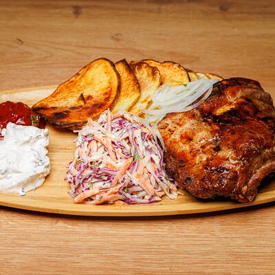 Ребра свиные с картофелем на мангале в THEКУХНЯ по цене 640 ₽