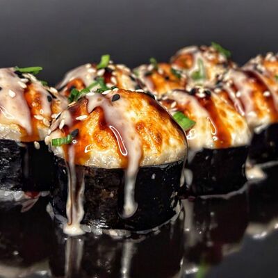 Запеченный с курицейв More sushi по цене 659 ₽