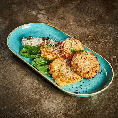 Рыбные котлеты на дранике с соусом риет в Корчма по цене 860 ₽