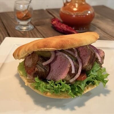 Бургер Стейк Свиная вырезка в Балкан Гриль Вкус Сербии по цене 860 ₽