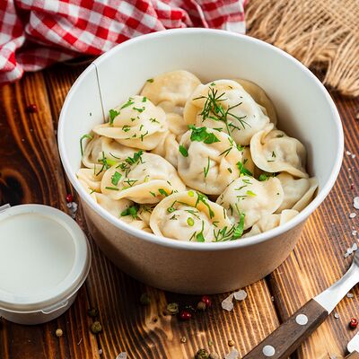 Пельмени домашние со сметанойв Toro burger по цене 289 ₽