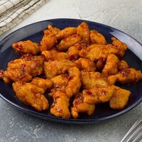 Жареная рыба в остром соевом соусе в Wok & Box