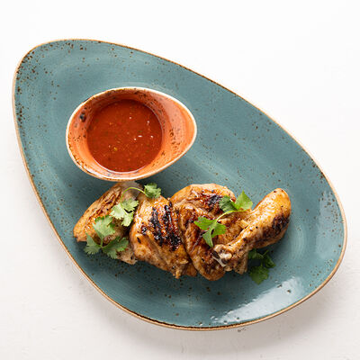 Цыпленок запеченный с аджикой в На берегу по цене 930 ₽