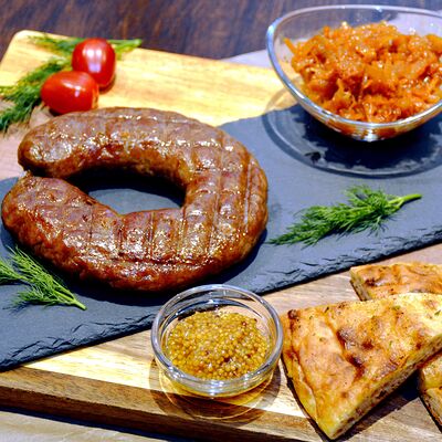 Говяжья колбаска в Славянка по цене 720 ₽