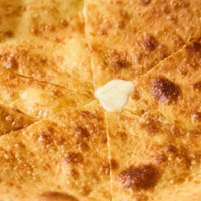 Имеретули - традиционный хачапури по-имеретински в NANA Pirveli по цене 750 ₽