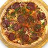 Пицца с охотничьими колбасками и дымным соусом барбекю L в Pizzaiolo по цене 689