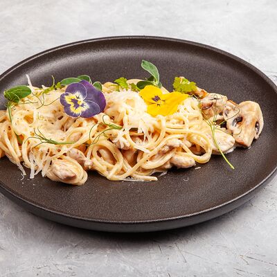 Паста с цыпленком и грибами в Смольный по цене 770 ₽
