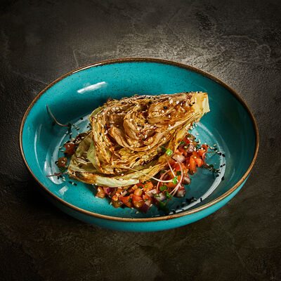 Стейк из салата айсберг в соусе терияки с томатной сальсой в Корчма по цене 310