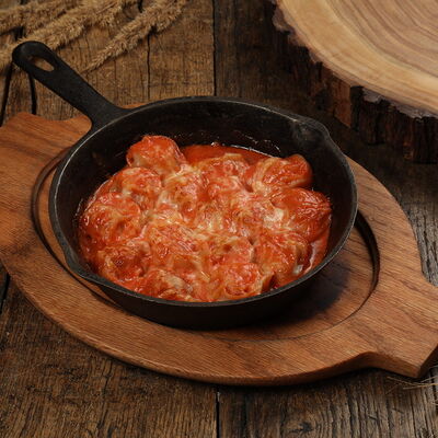 Пельмени мясные под томатно-трюфельным соусом с сыром в Ресторан Шинок по цене 850 ₽