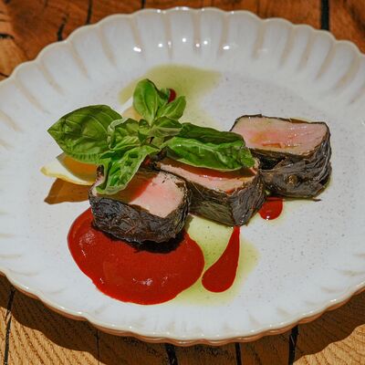 Тунец в виноградных листьях с вишнёвым капучино в Rekki Pizza & Cocktail Bar по цене 1290 ₽