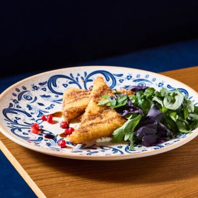 Стейк из сулугуни с кремом из молодого сыра в NANA Pirveli по цене 635 ₽