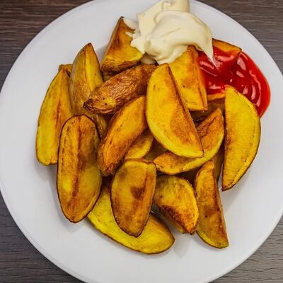 Картофель по-деревенски в Шашлычная 1 по цене 230 ₽