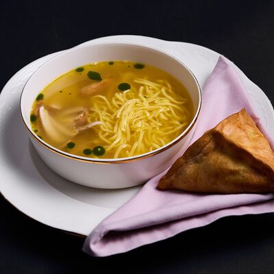 Суп-лапша с курицей с треугольником из говядины в Duran по цене 490 ₽