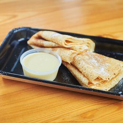 Блины со сгущёнкой в Кафе Солнце по цене 240 ₽