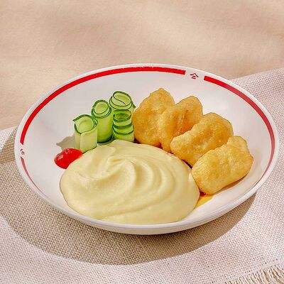 Куриные наггетсы с картофельным пюре в Тануки по цене 320 ₽