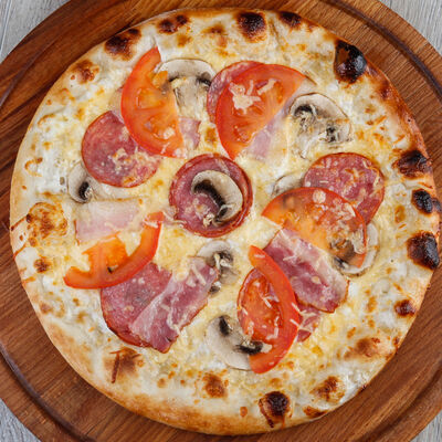 Пицца Дон Бекон в Пиццерия Помидор по цене 390 ₽