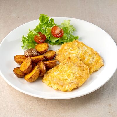 Отбивная из курицы в сырной корочке с картофелем по-деревенски в Жарицца Пицца по цене 430 ₽