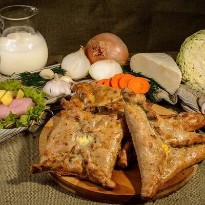 Чукуры с капустой и яйцом в Пироги по-коми по цене 1268 ₽