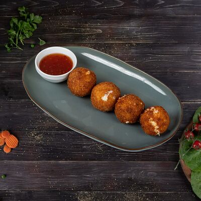 Сырные шарики в Ассадо по цене 370 ₽