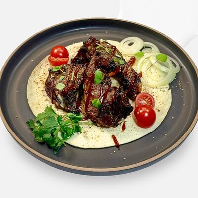 Бараньи рёбра BBQ в Caviar по цене 1540 ₽