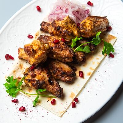 Крылья цыпленка в соусе Кимчи в Мясник travel по цене 375 ₽