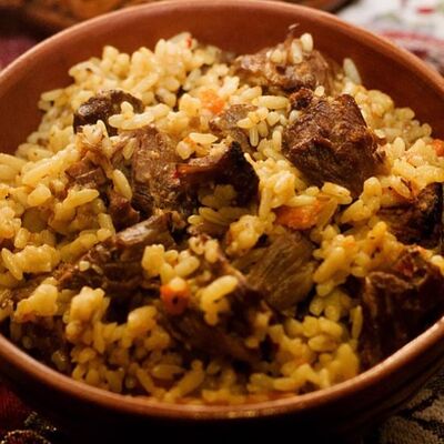 Плов по-узбекски в Mangal House по цене 490 ₽