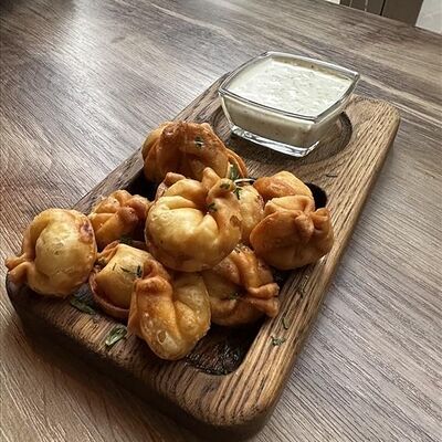 Пельмени жареные в Гастропаб Ёж по цене 660 ₽