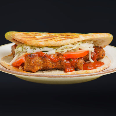 Люля-кебаб из курицы в пите в Гриль Хаус по цене 695 ₽