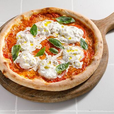 Пицца со страчателлой и томатами в Кукумбер по цене 850